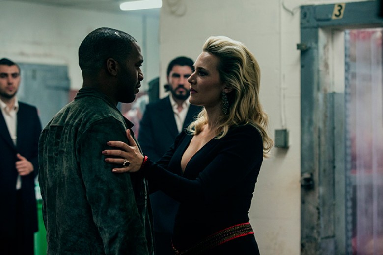 (Left to right) Chiwetel Ejiofor and Kate Winslet in TRIPLE 9. Photo credit: Bob Mahoney / Distributor: Open Road Films