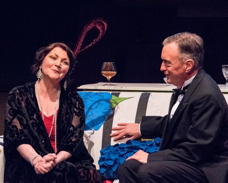 Retired actress Judith Bliss (Josephine Hogan) charms Richard Greatham (David Lundy), a proper English diplomat, in Noel Coward's "Hay Fever," on stage at ICTC through June 25. Photo by Gene Witkowski.
