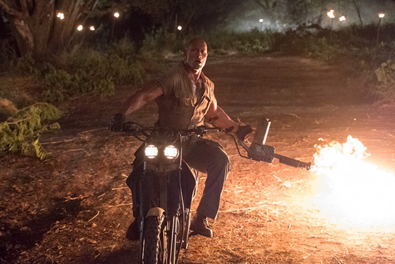 Dwayne Johnson stars in JUMANJI: WELCOME TO THE JUNGLE. PHOTO BY: Frank Masi ©2017 CTMG. All Rights Reserved. **ALL IMAGES ARE PROPERTY OF SONY PICTURES ENTERTAINMENT INC. FOR PROMOTIONAL USE ONLY. SALE, DUPLICATION OR TRANSFER OF THIS MATERIAL IS STRICTL