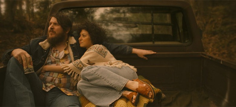 Ben Dickey as Blaze Foley, and Alia Shawkat as Sybil Rosen in Ethan Hawke’s BLAZE. Courtesy of IFC Films. An IFC Films release.