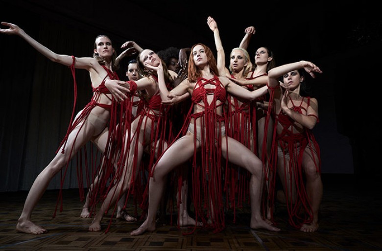 Mia Goth as Sara and Dakota Johnson as Susie star in Suspiria. Photo Credit: Alessio Bolzoni; Courtesy of Amazon Studios