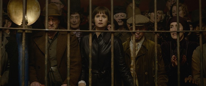 © 2018 WARNER BROS. ENTERTAINMENT INC. Photo Credit: Courtesy of Warner Bros. Pictures Caption: (Center) KATHERINE WATERSTON as Tina Goldstein in Warner Bros. Pictures’ fantasy adventure “FANTASTIC BEASTS: THE CRIMES OF GRINDELWALD,” a Warner Bros. Pictur