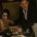 Nazanin Boniadi (left) as ’Zahra’ and Jason Isaacs (right) as ’Vasili’ in director Anthony Maras’ HOTEL MUMBAI, a Bleecker Street release.