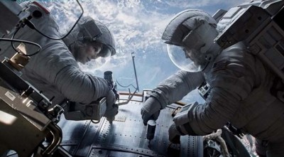 Sandra Bullock as Dr. Ryan Stone & George Clooney as Matt Kowalsky 