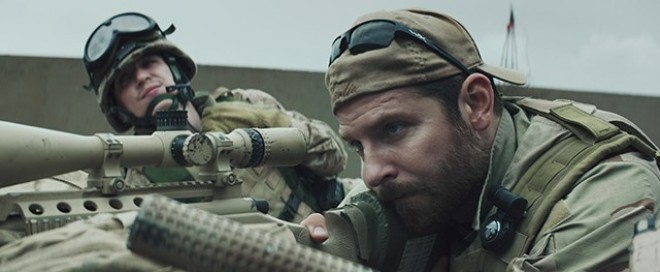Photo Credit: Courtesy of Warner Bros. Pictures. Caption: (L-r) KYLE GALLNER as Goat-Winston and BRADLEY COOPER as Chris Kyle in Warner Bros. Pictures’ and Village Roadshow Pictures’ drama “AMERICAN SNIPER."